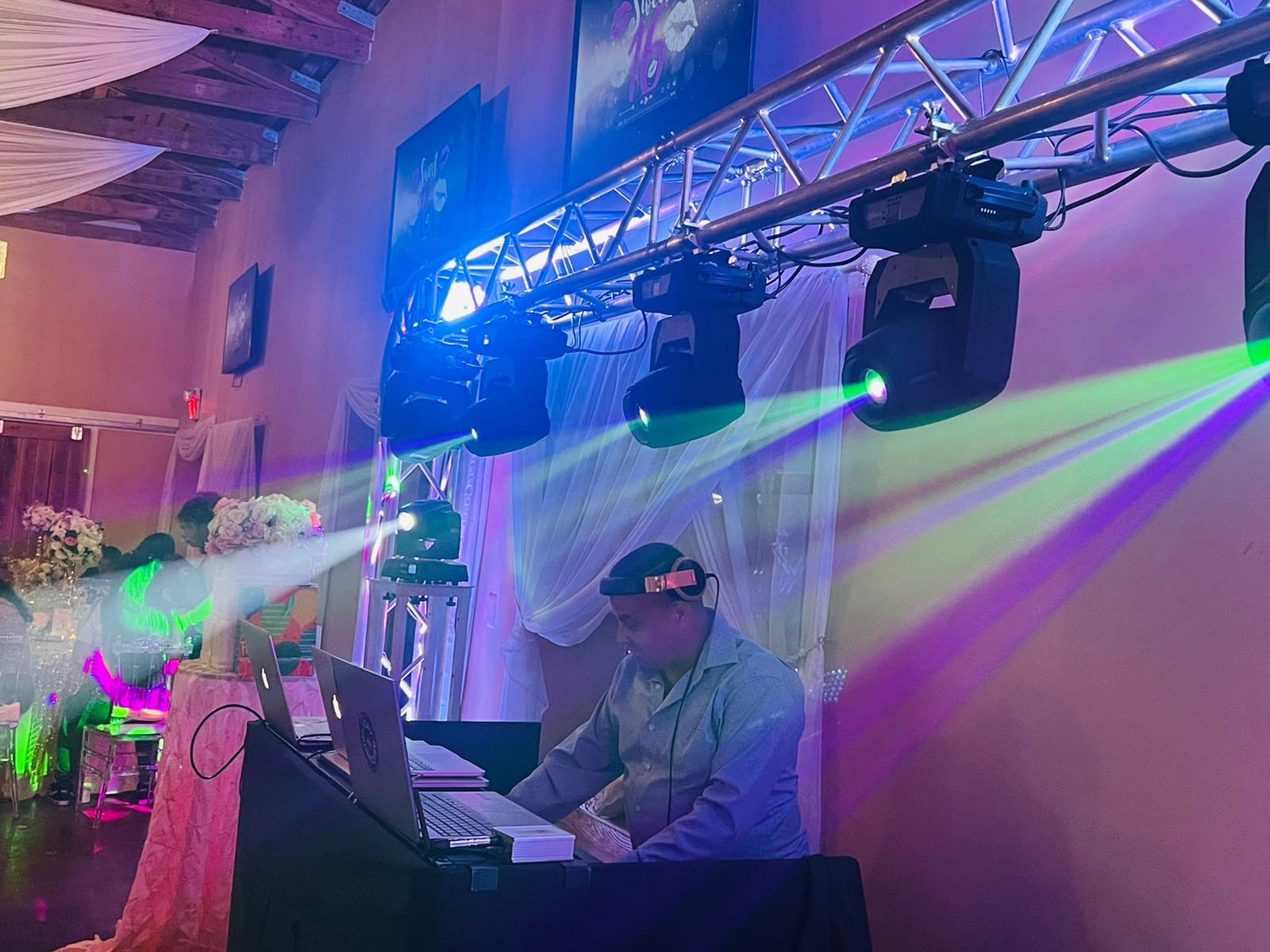 Professional DJ spinning records at Metro Beat Events DMV