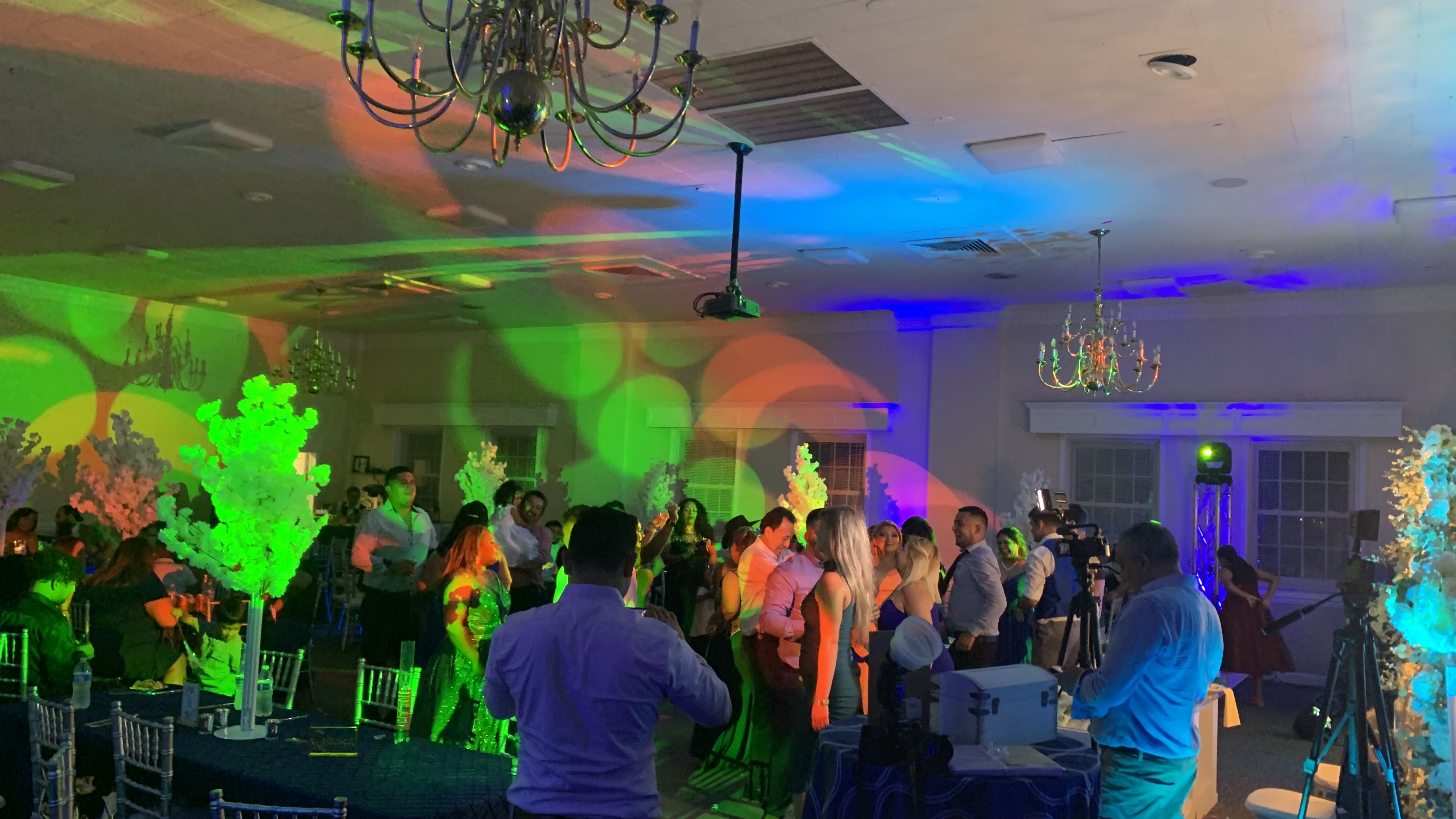 Guests dancing on dance floor at event